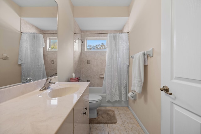 full bathroom with toilet, vanity, tile patterned floors, and shower / bath combo with shower curtain