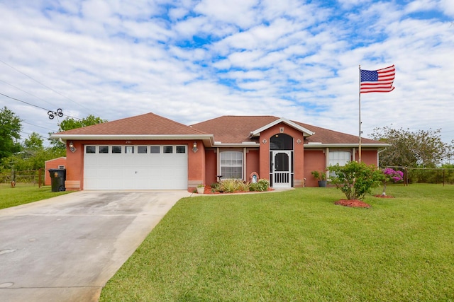 single story home with driveway, a front lawn, a garage, and fence