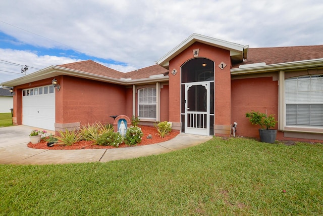 ranch-style house with an attached garage, a shingled roof, stucco siding, a front lawn, and concrete driveway