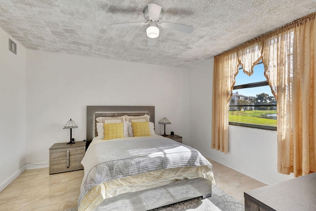 bedroom featuring ceiling fan