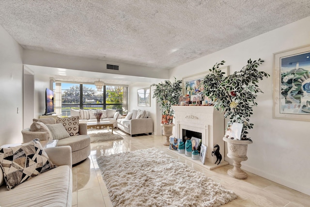 living room featuring a textured ceiling