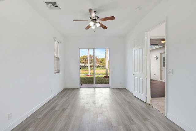 unfurnished room featuring light hardwood / wood-style flooring and ceiling fan