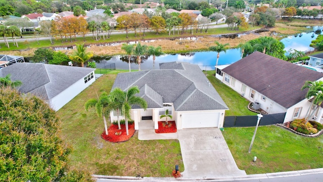 bird's eye view with a water view