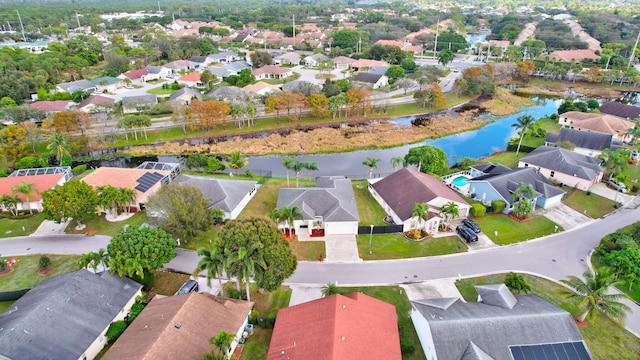 drone / aerial view featuring a water view