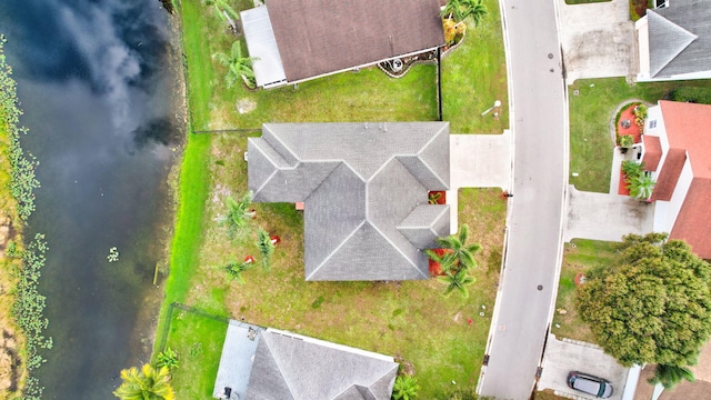 drone / aerial view featuring a water view