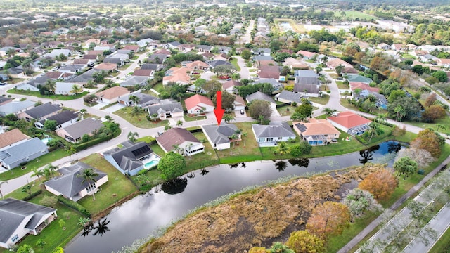 drone / aerial view featuring a water view