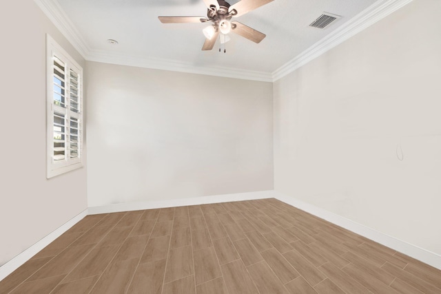 unfurnished room with hardwood / wood-style flooring, ceiling fan, and crown molding