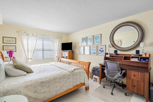 tiled bedroom with a textured ceiling