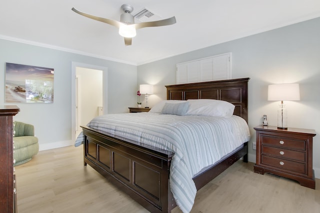 bedroom featuring ceiling fan, crown molding, and light hardwood / wood-style flooring