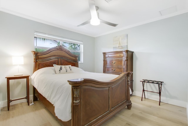 bedroom with ceiling fan, light hardwood / wood-style flooring, and crown molding