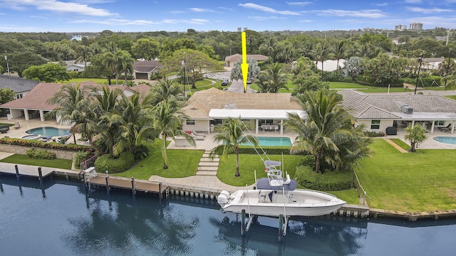 drone / aerial view featuring a water view