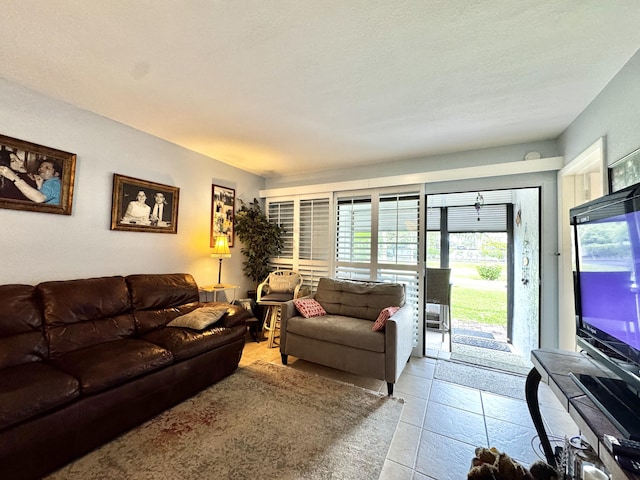 living room featuring light tile patterned floors