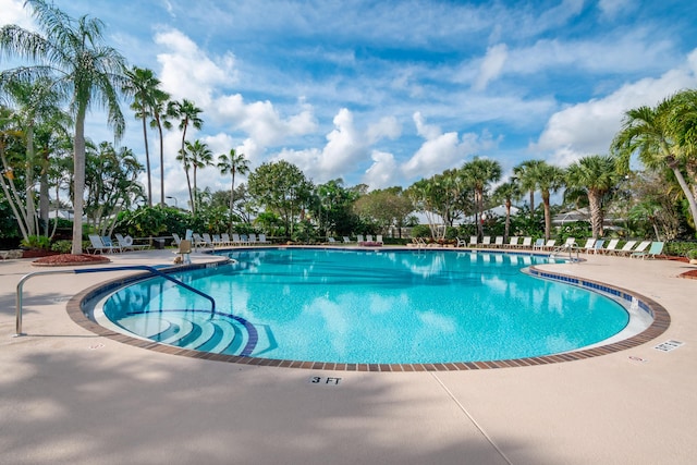 community pool with a patio