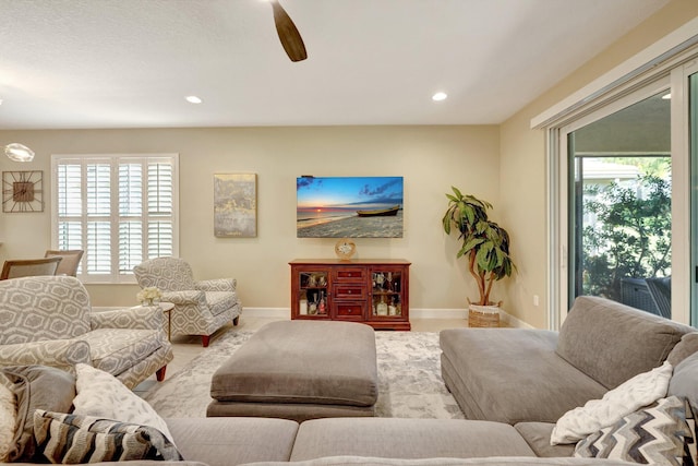 living room featuring ceiling fan