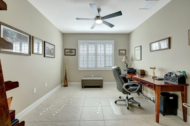 office space featuring ceiling fan and light tile patterned floors