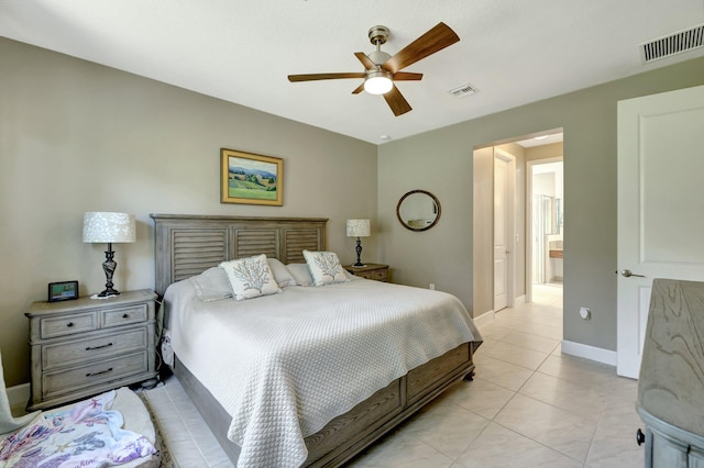 bedroom with ceiling fan and light tile patterned flooring