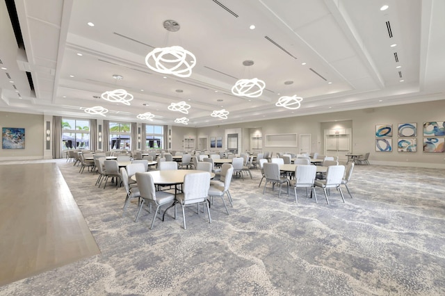 dining space with a tray ceiling