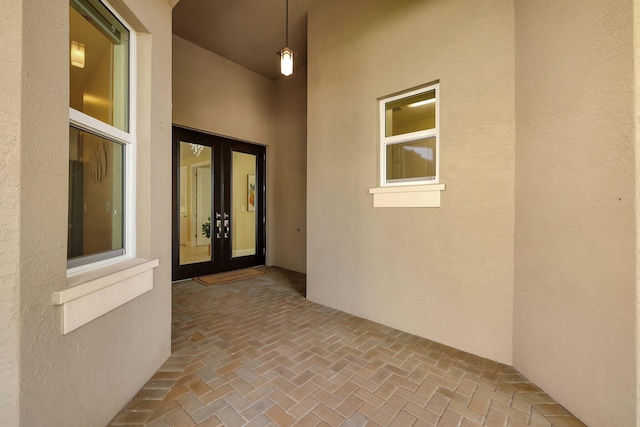 doorway to property featuring french doors