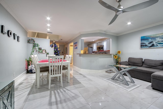 dining area with ceiling fan and ornamental molding