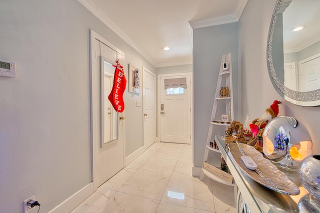 entryway featuring built in shelves and crown molding