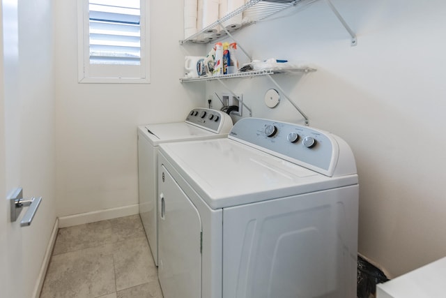 laundry room with separate washer and dryer