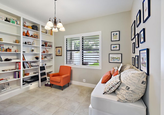 living area with light tile patterned floors and an inviting chandelier