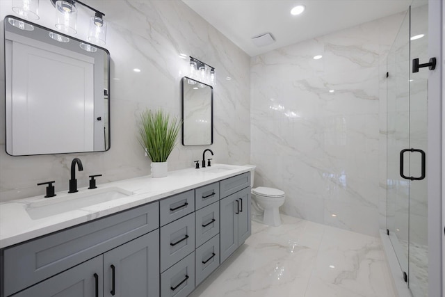 bathroom with toilet, vanity, tile walls, and walk in shower