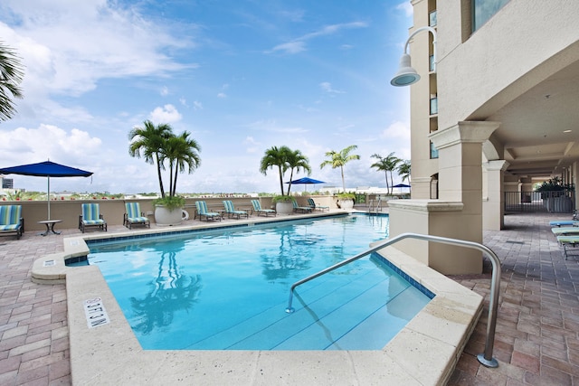 view of swimming pool featuring a patio