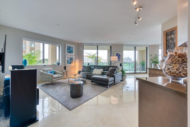 living room with floor to ceiling windows