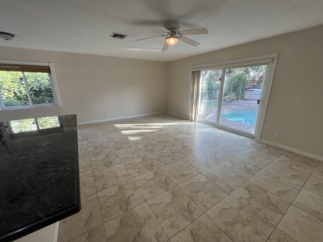 empty room with ceiling fan