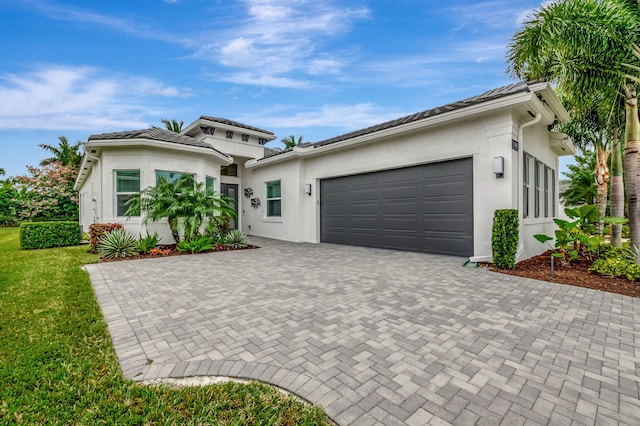 view of front of house with a garage