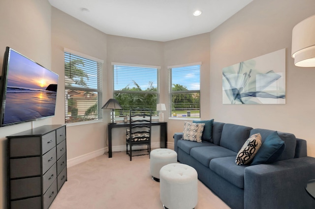 carpeted living room with a wall mounted air conditioner