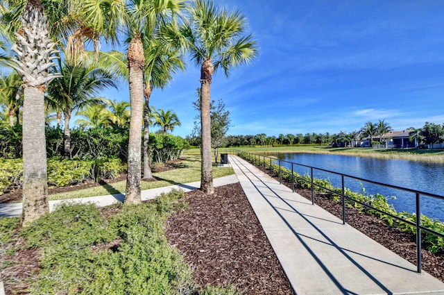 surrounding community with a water view