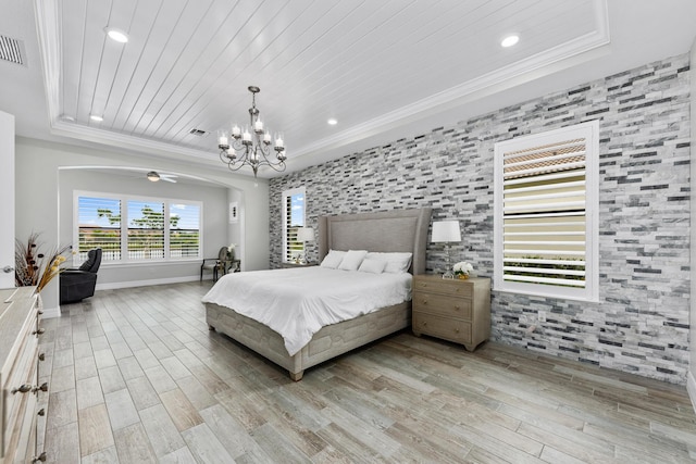 bedroom with ornamental molding, light wood-type flooring, a tray ceiling, and wooden ceiling