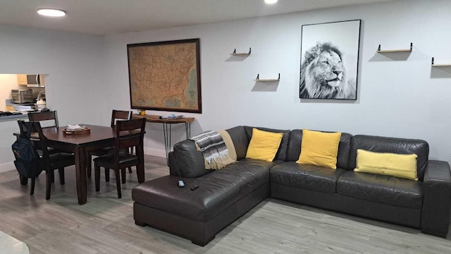 living room featuring light wood-type flooring