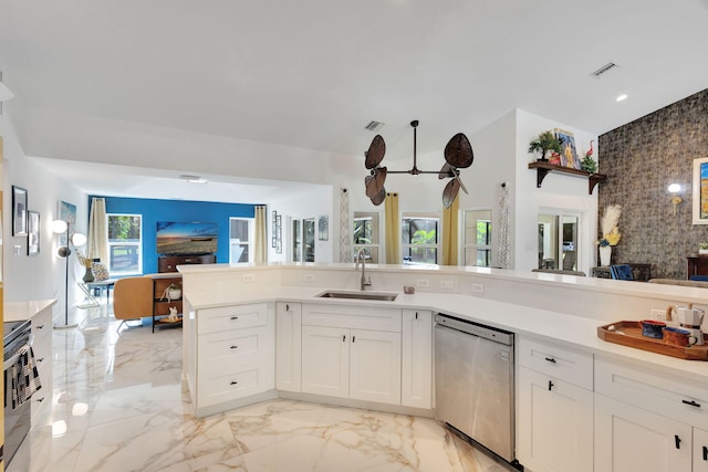 kitchen featuring white cabinetry, ceiling fan, dishwasher, sink, and range