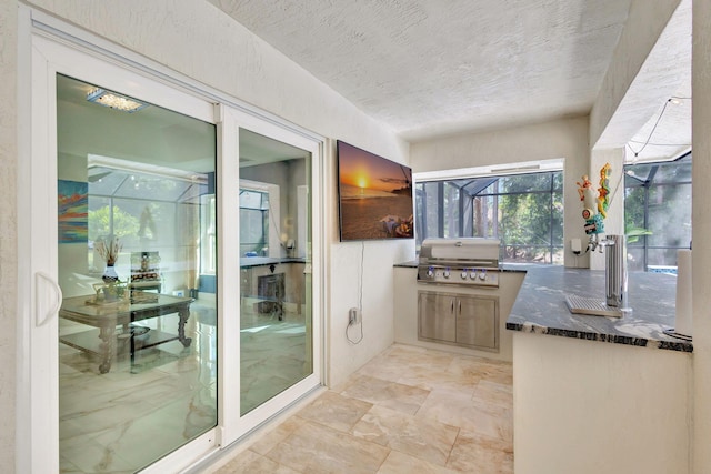 bathroom featuring a textured ceiling