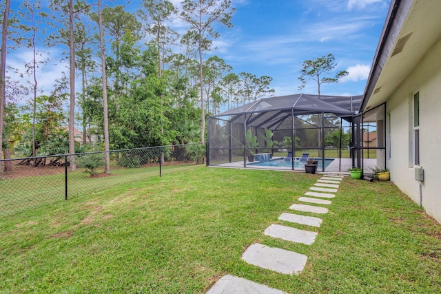 view of yard with a lanai