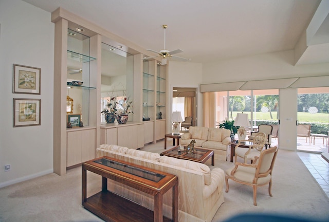 living room with light carpet and ceiling fan