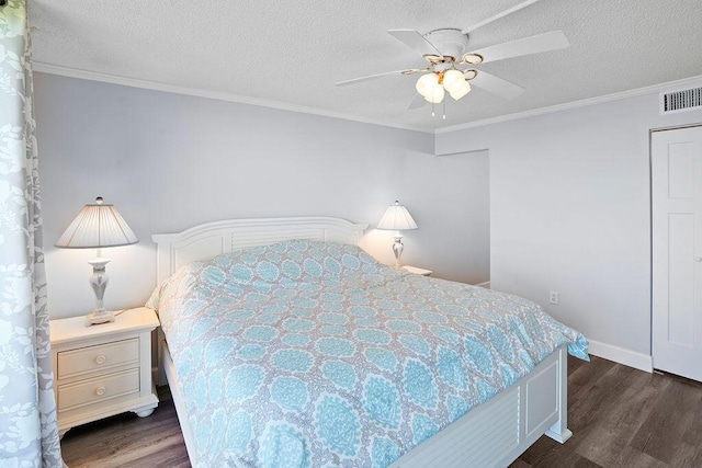 bedroom featuring a textured ceiling, ceiling fan, crown molding, and dark wood-type flooring