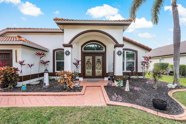 property entrance featuring french doors