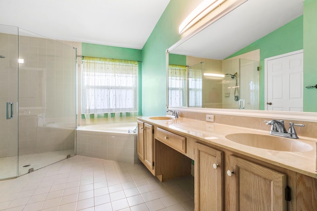 bathroom with shower with separate bathtub, tile patterned floors, and vanity