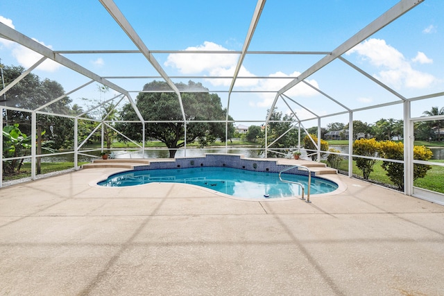 view of pool featuring a lanai, a patio area, and a water view