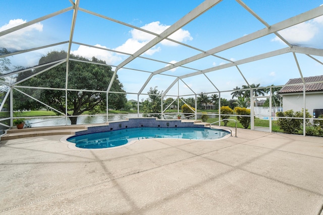 view of pool with a lanai, a patio, and a water view