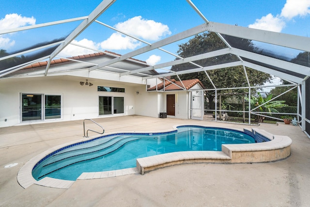 view of pool featuring a lanai and a patio