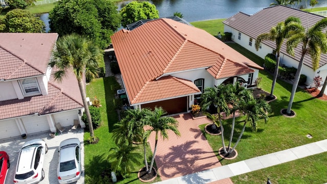 birds eye view of property featuring a water view