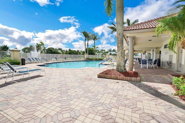 view of swimming pool featuring a patio area