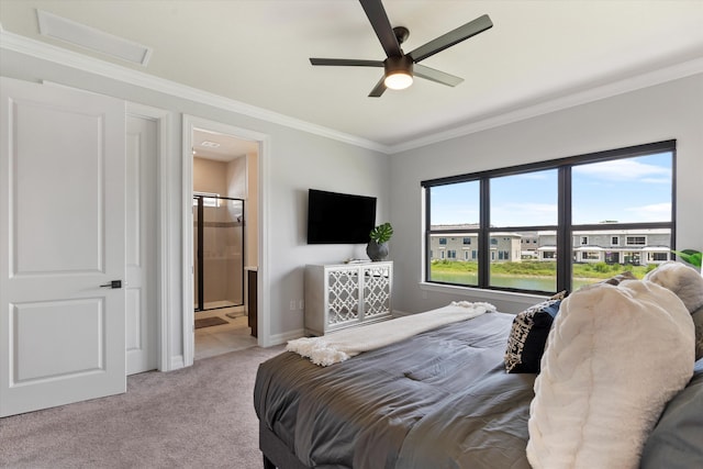 carpeted bedroom with ceiling fan, ornamental molding, and connected bathroom