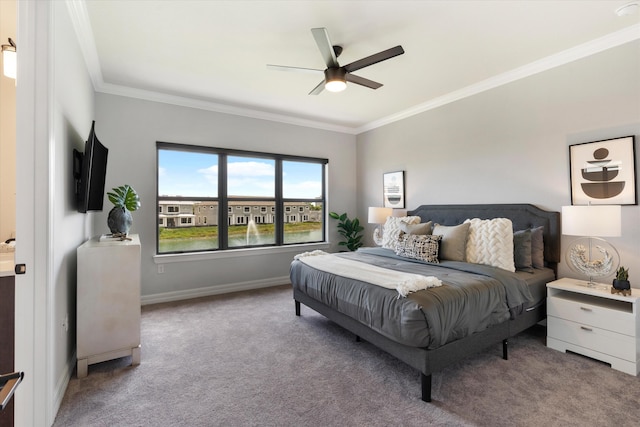 bedroom with ceiling fan, ornamental molding, and light carpet