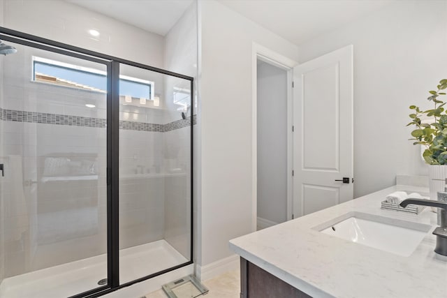 bathroom with vanity, tile patterned floors, and walk in shower